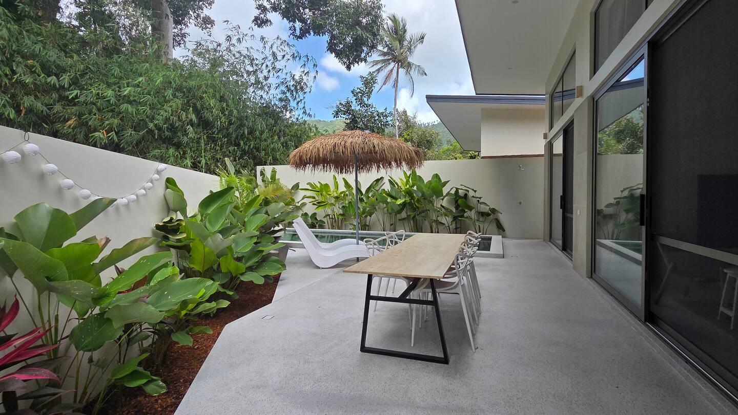 Outdoor terrace and dining area at Pool Villa Lamai with tropical garden and pool, Koh Samui